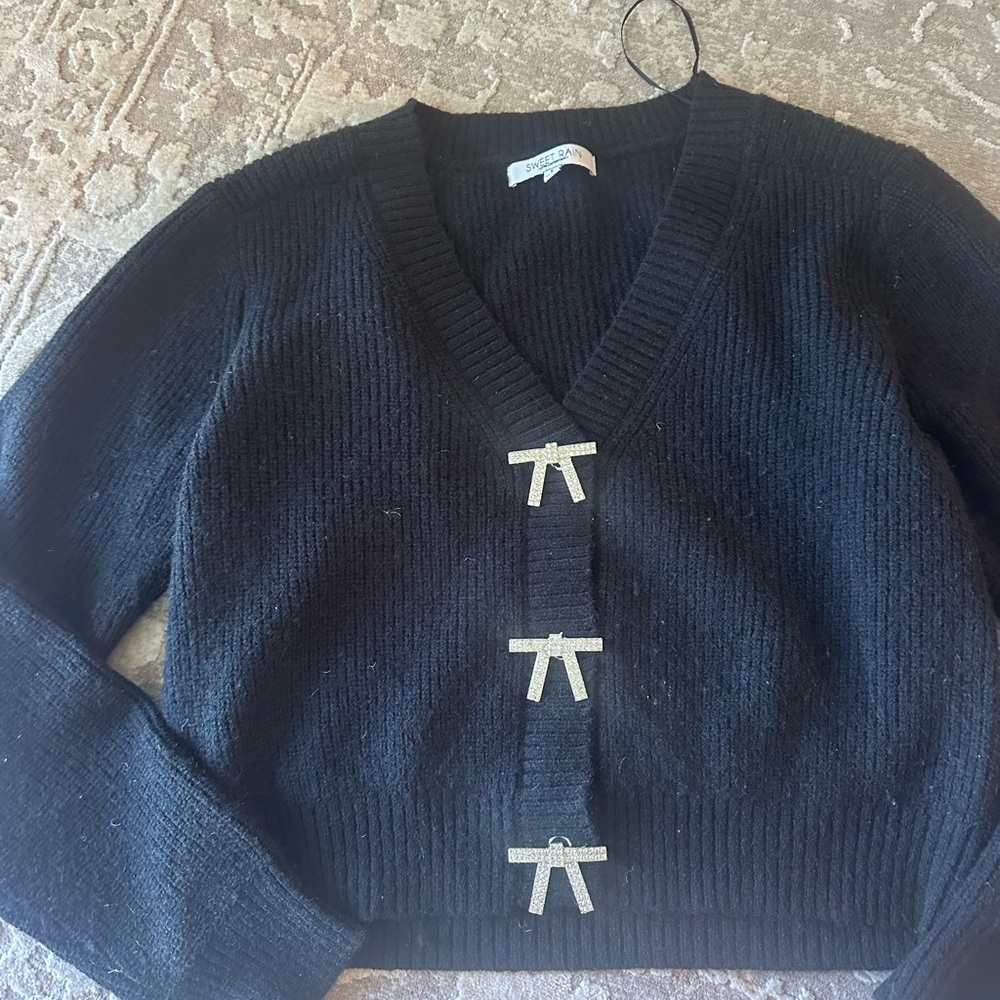 Vici Black Knit V-Neck Sweater with Silver Bow Accents - Picture 2 of 5
